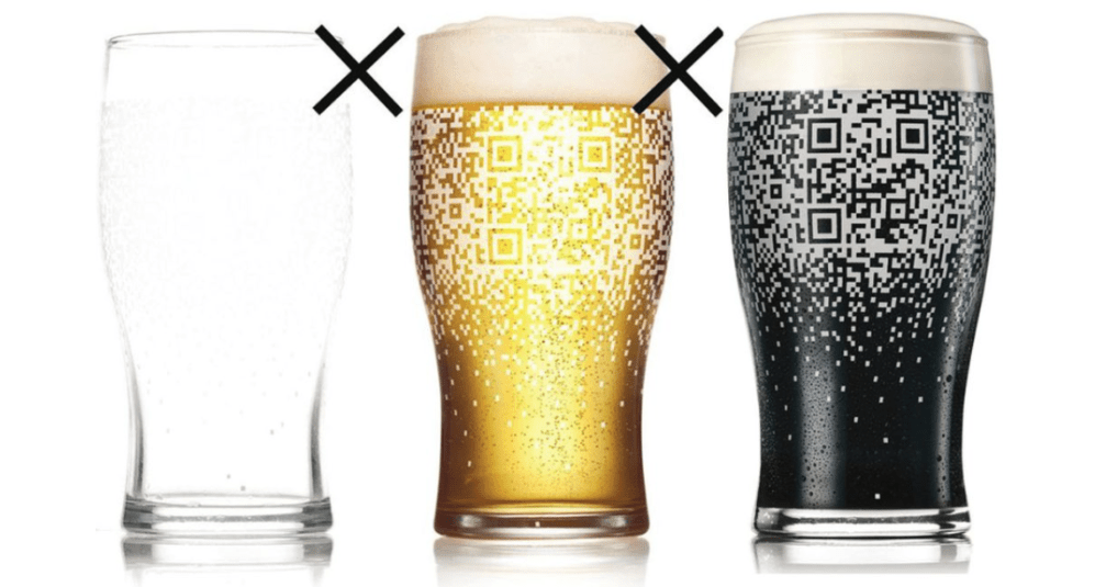 Guinness mug showing a QR code when filled class=